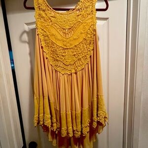 Nice blouse or mini dress baby doll effect with high and low affect